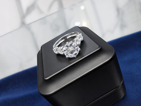 3 Carat Round Moissanite Engagement Ring, GRA Certified D VVS1 Solitaire with Side Stones in Rhodium-Plated Silver.